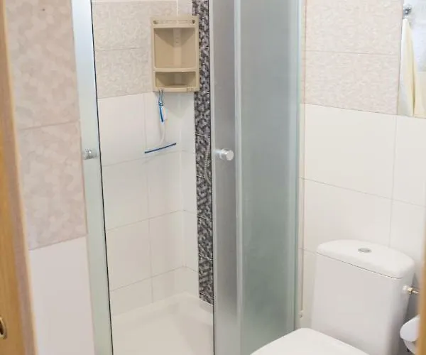 Деревянный коттедж Nad Jeziorem/seehaus 1b