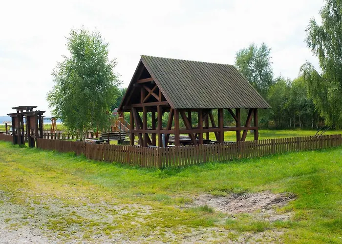 Деревянный коттедж Nad Jeziorem/seehaus 1b